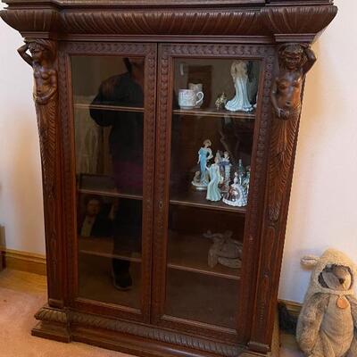 Incredible cabinet hand carved with French women on front 