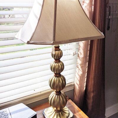 One of a pair of lamps with gold graduated base