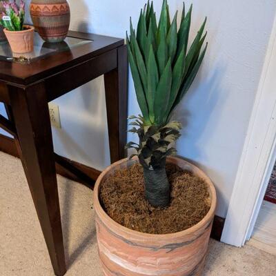 Faux cactus in large planter