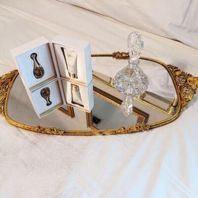 Gold fillegree mirrored tray and perfume and crystal perfume bottle