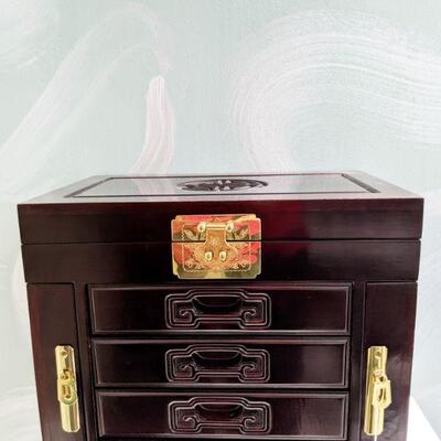 Extremely Nice mahogany Jewelry box with 4 drawers and top that opens.  NEW!