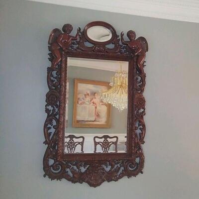 mahogany cherub mirror 56 by 36