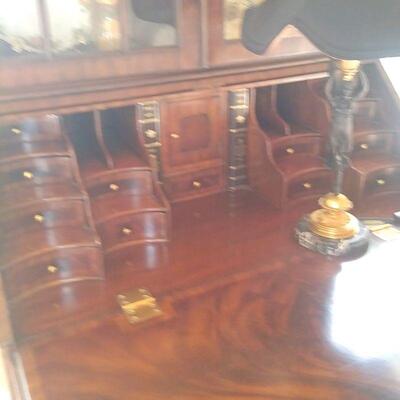 incredible amount of small storage drawers in this secretary