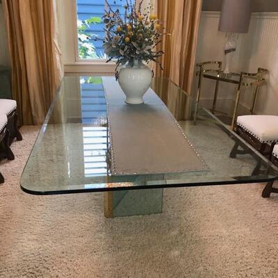 Glass and brass dining table $850
42 X 84 X 29