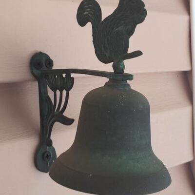 Brass bell with squirrel