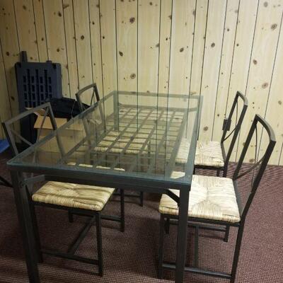 small glass top kitchen table with 4 chairs