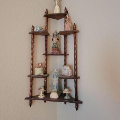 Vintage wood coating shelf display and porcelain figurines