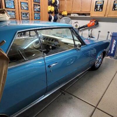 Light blue 1965 Pontiac GTO 