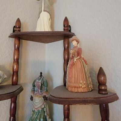 Vintage wood floating shelf display and figurines