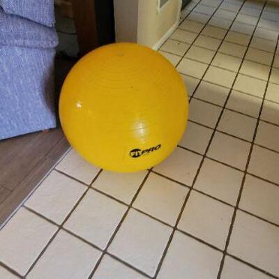 Yellow yoga/pilates ball