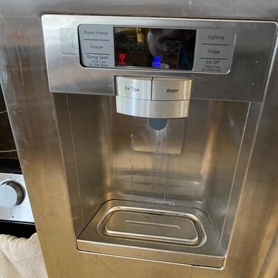 Samsung chrome two door refrigerator (water/ice dispenser detail)