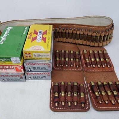 8674	

One leather bandolier with 30-30 WIN cartridges, Six boxes of 30-30 WIN cartridges, and 20 30-30 win cartridges in leather...