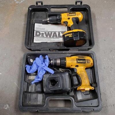 2572	

Two Dewalt Screw Guns with battery and battery charger
Two dewalt screw guns with one battery and kne battery charger
