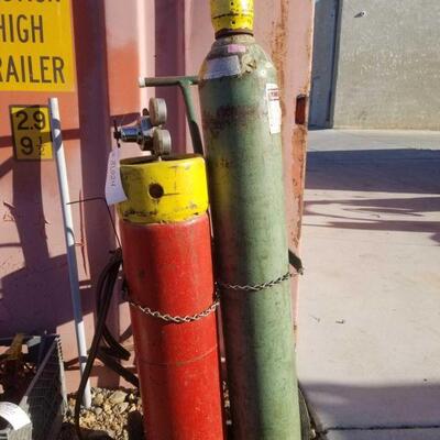81024	

Acetylene Tank And Oxygen Tank With Welding Equipment
Oxygen Tank Measures Approximately: 53