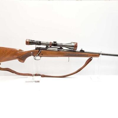 #550 â€¢ Winchester 70 .30-60 Bolt Action Rifle With Scope Serial No. G945277. 