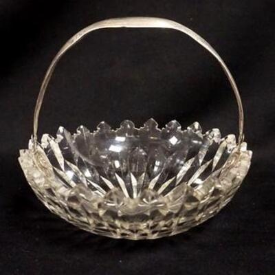 1087	CUT PANELED BOWL W/COIN SILVER HANDLE, SOME ROUGHNESS IN TOP, 7 IN WIDE
