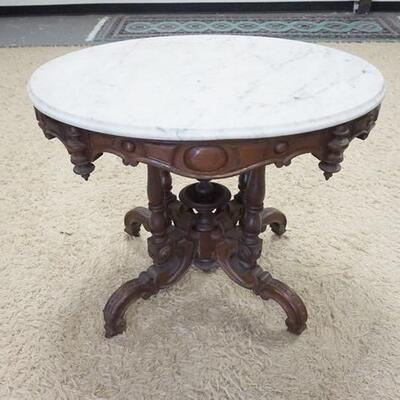 1133	VICTORIAN OVAL MARBLE TOP TABLE FOR PARLOR, 34 1/2 IN X 25 IN X 27 1/4 IN HIGH
