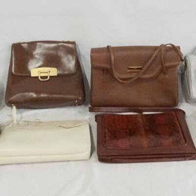 1239	LOT OF 6 PURSES/POCKET BOOKS. LOT INCLUDES; MARKAY, MAGID & MISS LEWIS. VARYING DEGREES OF WEAR AS FOUND. 
