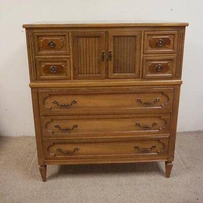 1215	7 DRAWER BATCHELOR CHEST W/CENTER COMPARTMENT, FINISH WORN ON TOP, 44 IN X 20 IN X 51 IN
