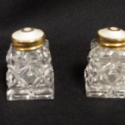 1155	DANISH SALT & PEPPERS W/STERLING LIDS
