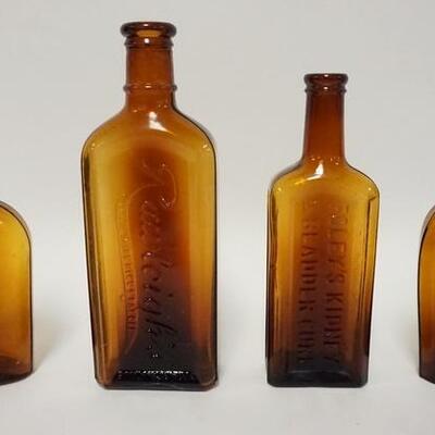 1037	4 OLD AMBER GLASS BOTTLES INCLUDING FOLEY'S KIDNEY & BLADDER CURE, RAULEIGH'S, ETC. TALLEST IS 8 1/2 IN
