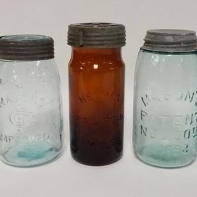 1034	5 CANNING JARS W/ AMBER HELMANS RAILROAD MILES WOODBURY IMPROVED, ETC. TALLEST IS 7 1/2 IN 
