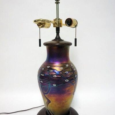 1024	ZELLIQUE ART GLASS LAMP HAS CUSTOM WOODEN BASE SIGNED BY THE WOODWORKER. 22 1/4 IN H
