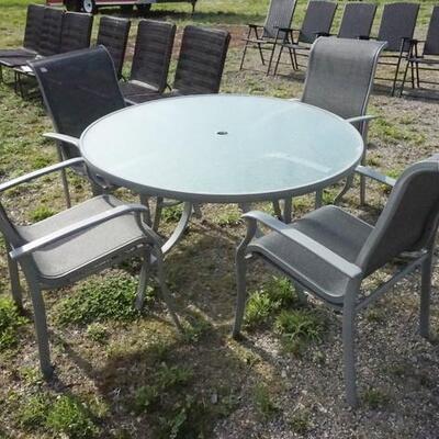 1204	GLASS TOP PATIO TABLE W/4 CHAIRS
