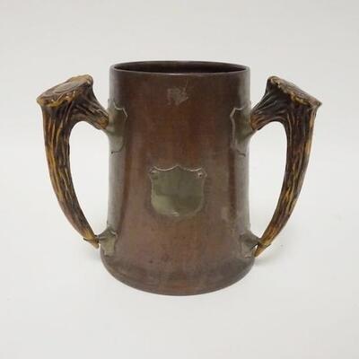 1072	COPPER TANKARD W/3 STAG HANDLES POSSIBLY FOR AN AWARD OR TROPHY, 6 IN HIGH
