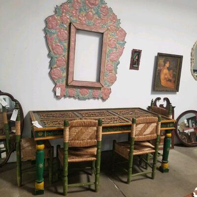 Picture of table with large frame above for size reference
