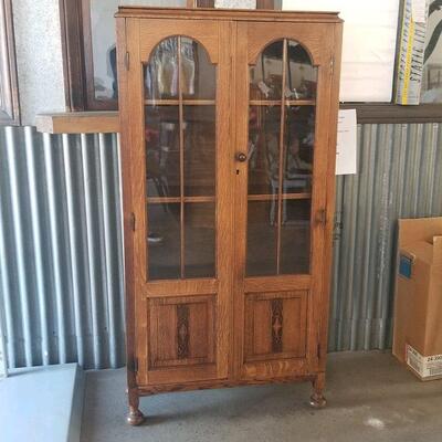 Vintage cabinet with original glass. Approx. 30 width x 10 depth x 60 height