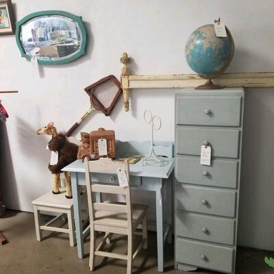 many pieces of  vintage wood children's  furniture. 