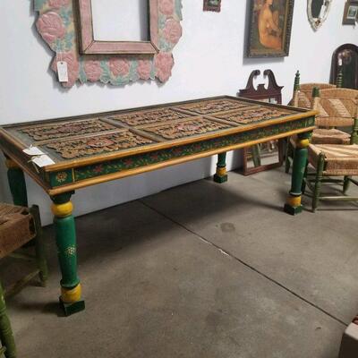 Vintage hand carved/ hand painted wood table. Purchased from Arte de Mexico in 1996. It's an antique carved door made into a table....