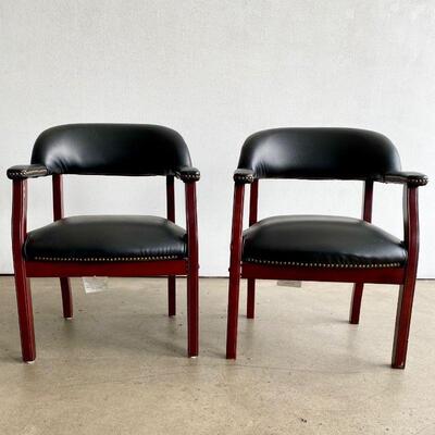 Pair of Mid Century Modern guest/library chairs. Nail head trim