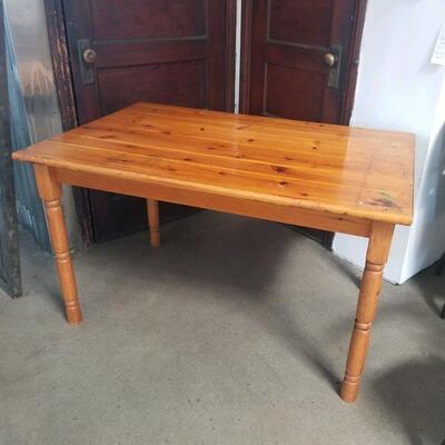 Vintage pine farmtable; 31" wide x 47" length 27 1/2" table height. legs can be removed with wrench for transport