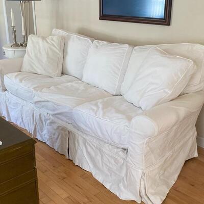 White Slipcovered Sofa. Good Condition. 78 long. $350.00