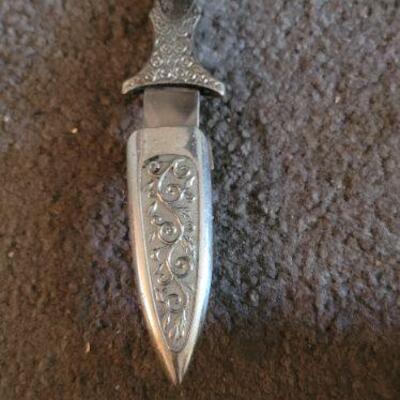 Ornate silver dagger and case