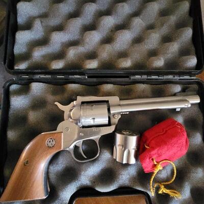 Silver revolver with wood handle and case 
