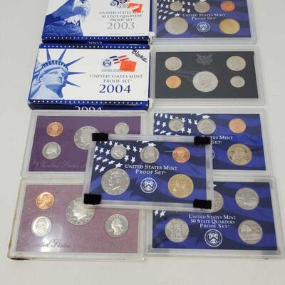 824	

9 United States Mint Proof Sets
9 United States Mint Proof Sets