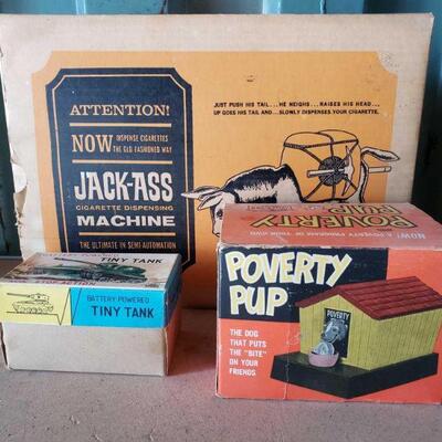 3066	

Vintage Battery Operated Toys & Jack-Ass Cigarette Dispensing Machine
Vintage Battery Operated Toys. Tiny Tank. Poverty Pup...
