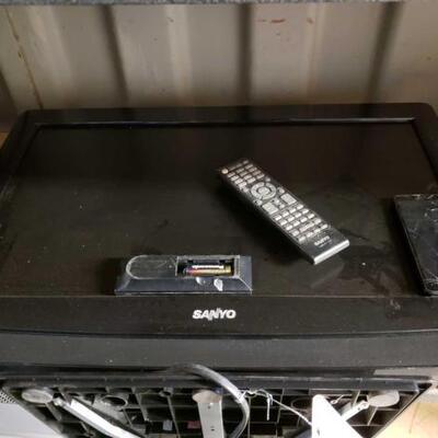 7508	

Sanyo TV With Remote And Wiko Phone
Surrounding Items Not Included!!