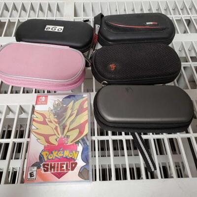 
#2340 â€¢ Pokemon Shield Switch Game, PSP Cases, 3 PSP Hand Held Video Games