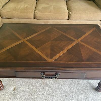 Ashley Furniture Dark Brown Coffee Table - 50" Long x 29" Wide x 18" Tall - $100