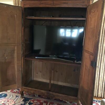 TV not for sale - showing what size tv fits. 
Super nice antique!! 