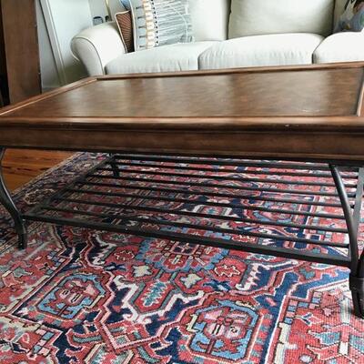 coffee table with leather top and wrought iron shelf $165
48 X 28 X 18 1/2