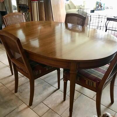 Henredon dining table with 3 leaves and set of 4 chairs $299
table 64 + 3 leaves 12