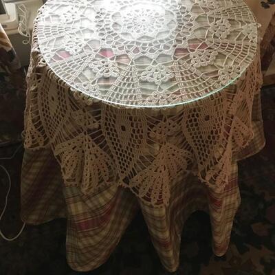 display table with custom made skirt, crocheted topper and glass $85
20 X 25