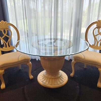3002	

Glass Top Table with 2 Chairs
Table measures 48" in diameter