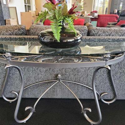 2018	

2 Glass Top Entry Way Tables with Vases
Tables measures approx 52