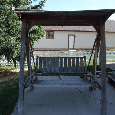 Porch swing needs refinishing $250